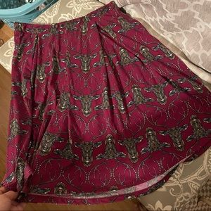 Maroon skirt with deer design